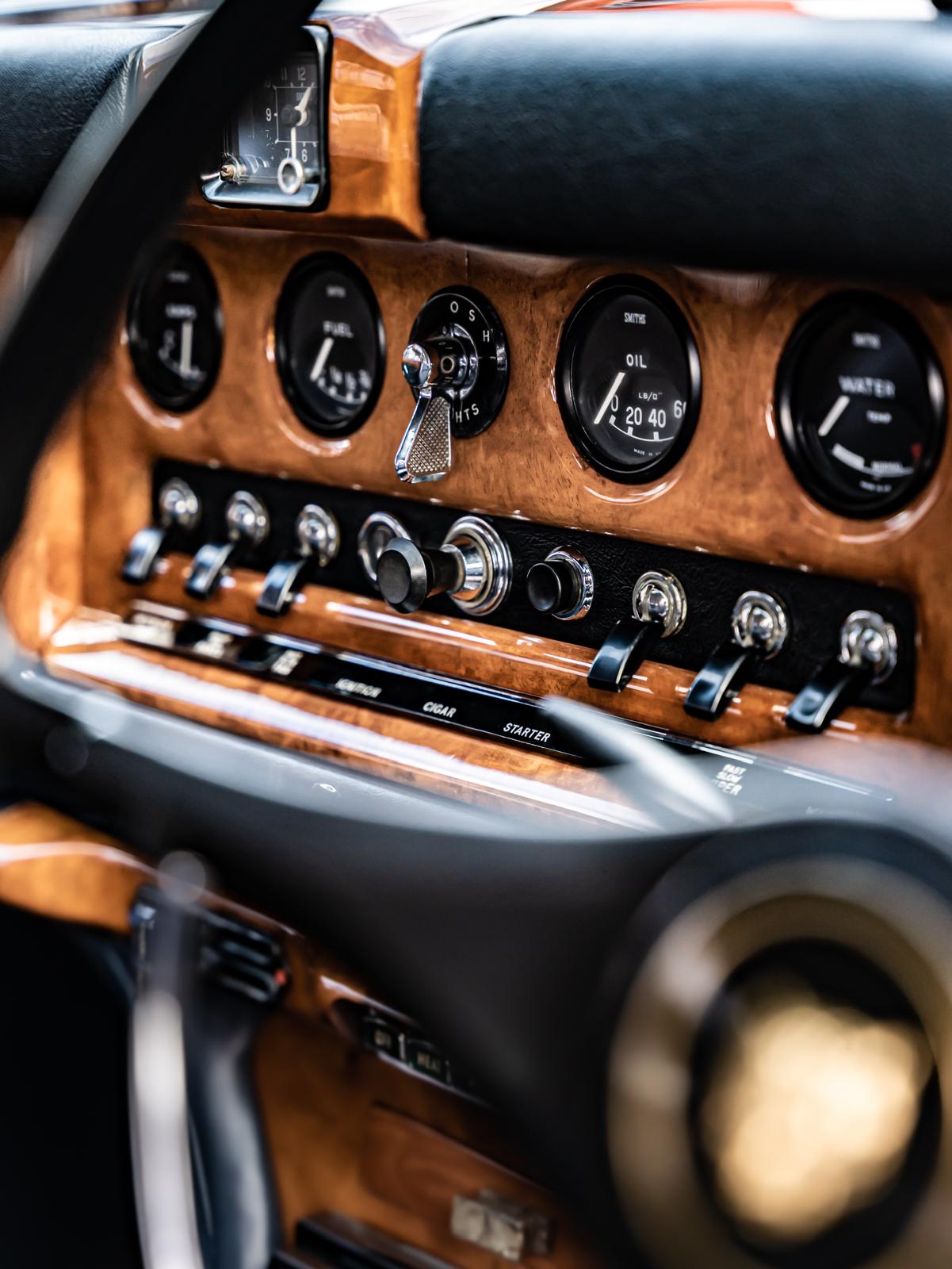 Burl walnut dashboard and Smiths gauges inside a classic Jaguar