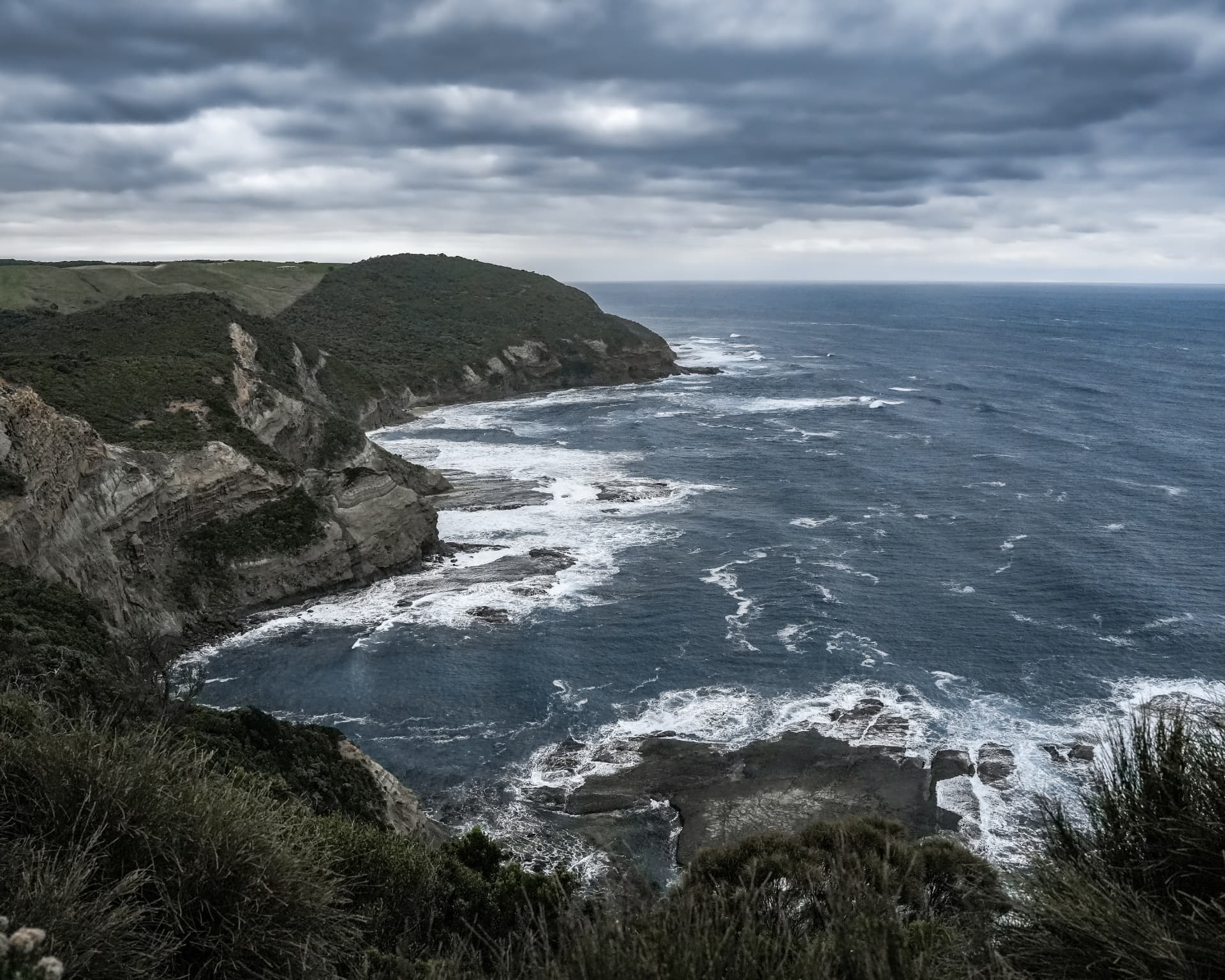 Storm clouds over sea cliffs along the Victorian coastline
